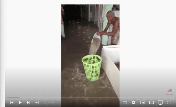 Links to a YouTube video of a man draining a flood using a bin with holes
