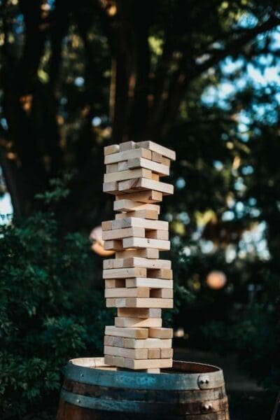 Jenga blocks on top of a barrel outside