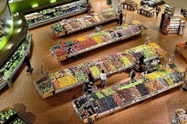 Overhead view of the fruit and veg section of a large supermarket