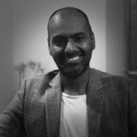 Jay Raham A black and white head shot of Jay Raham