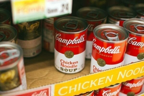 Campbells chicken noodle soups cans Cans of Campbell's chicken noodle soup on a supermarket shelf