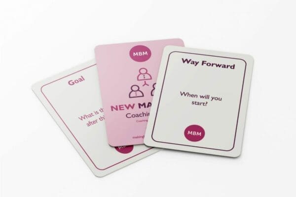 3 coaching cards fanned out on a white surface