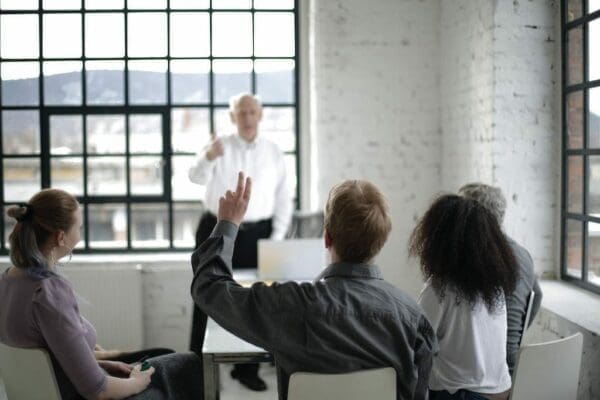 Business people playing office trivia