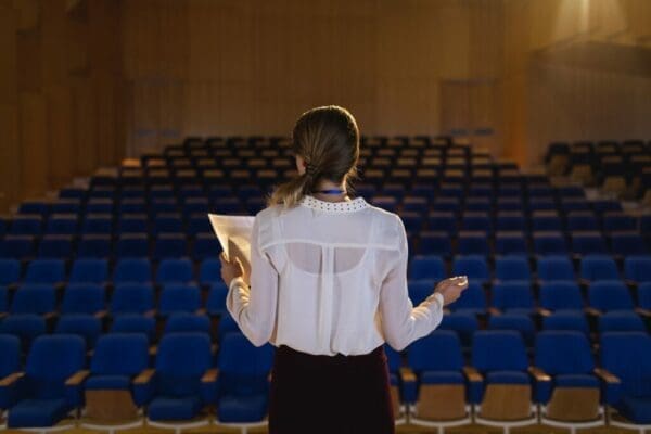 Woman practising a presentation in front of no audience