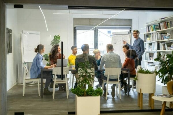 Businessman presenting to other coworkers in a meeting room