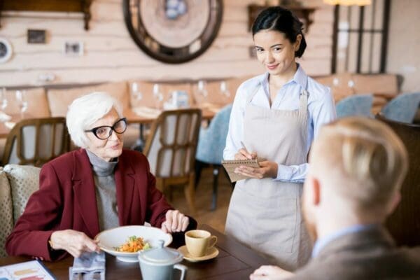 Restaurant waitress displaying time management skills