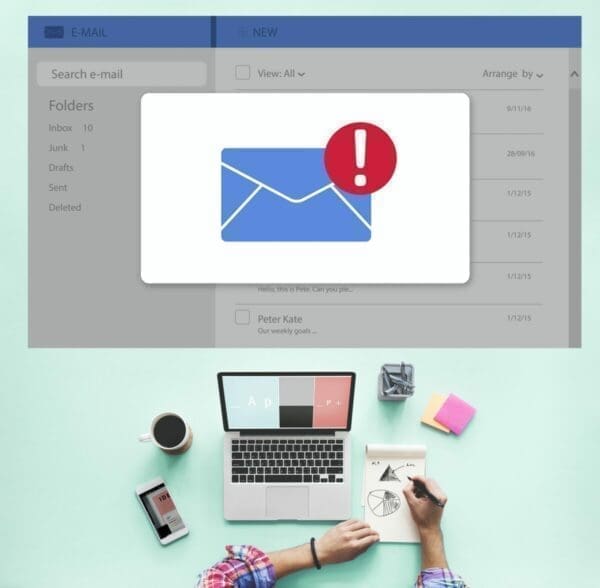 Email inbox with notification alert and working desk below represents email distraction