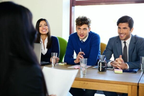 Business woman sitting at interview in office