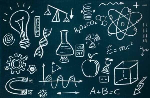 mathematical symbol chalk drawings on a blackboard