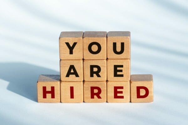 You are Hired phrase on wooden blocks