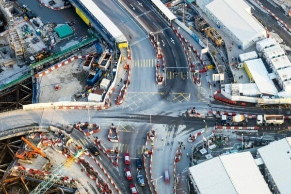 Aerial view of a busy crossroad with moving cars