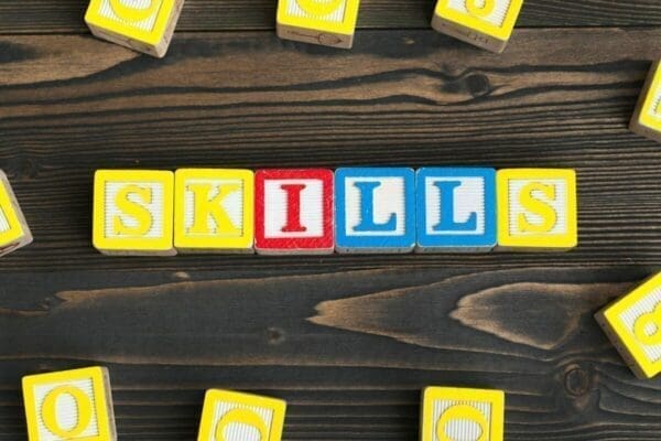 Colourful alphabet blocks spelling the work Skills