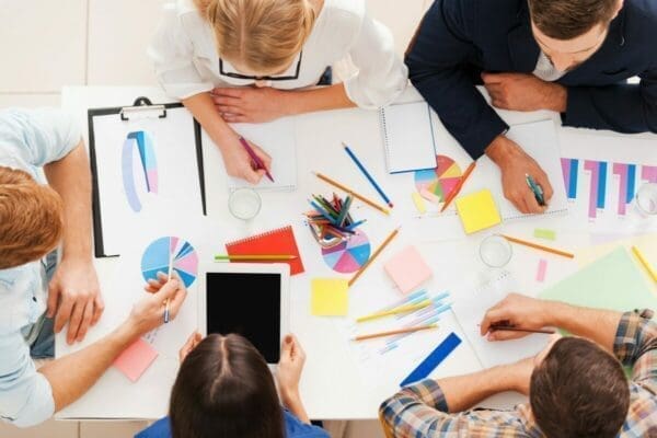 Creative team at work around a table