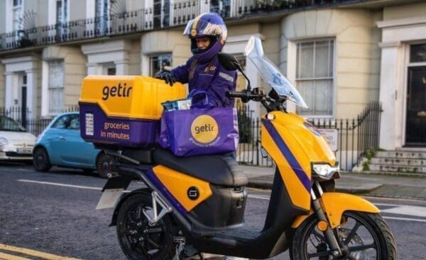 Delivery driver on a getir bike delivering shopping