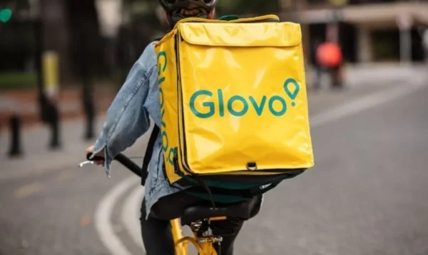 Glovo bike delivery with yellow box bag on back