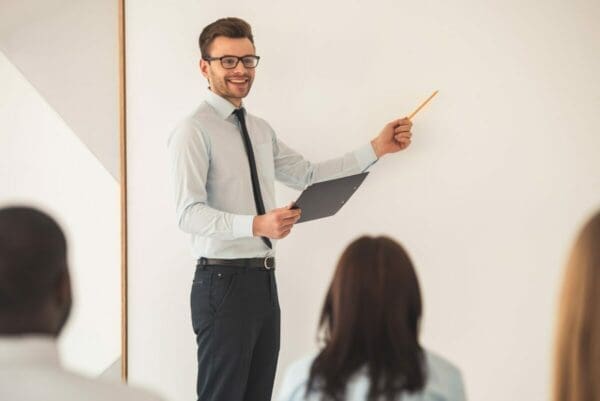 Businessman conducting his presence in a presentation