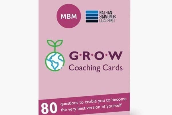 3D image of a GROW coaching card deck in pink and purple.