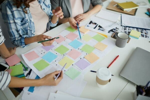 Desk view of a creative team planning together