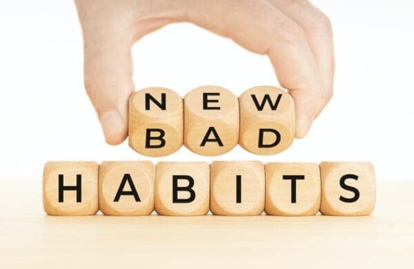 From Bad to new habits spelled with wooden cubes
