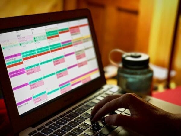 calendar management Laptop showing colourful calendar management