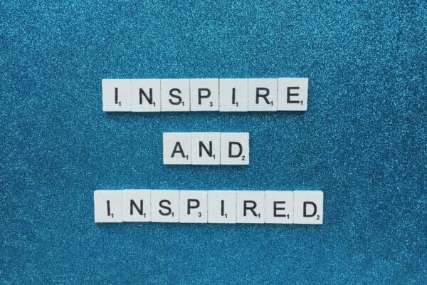 Inspire and inspired Inspirational Leadership quote on blue background