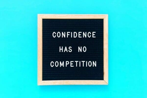 Confidence has no competition quote with blue background