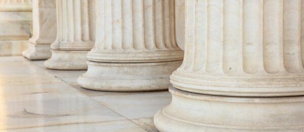 Greek white marble pillars in a row