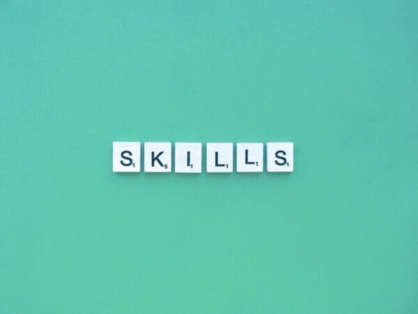 Skills scrabble letters word on a green background