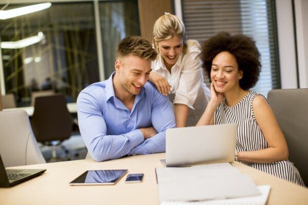 Inspiring female leader with her two colleagues