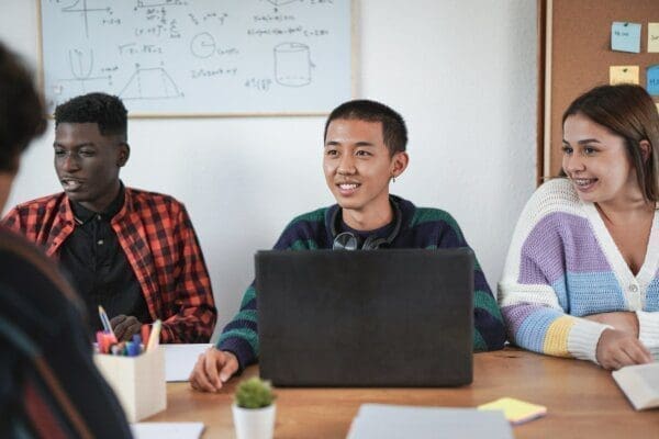 Young students learning together from a trainer