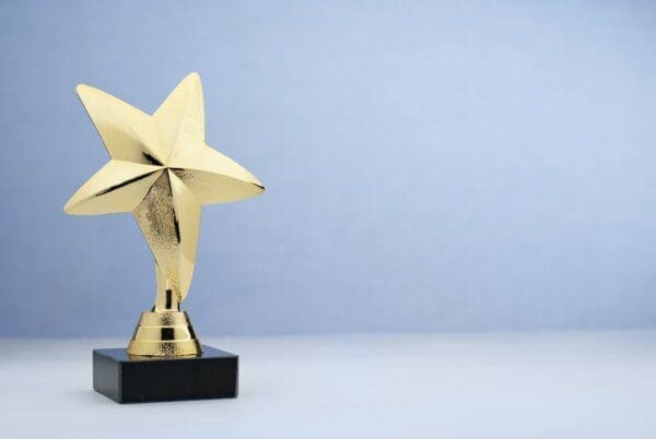 Reward Star shaped golden trophy for rewarding in contest