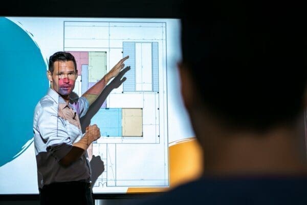 Presentation Businessman pointing to his presentation slides