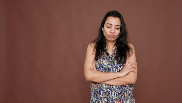 Disappointed person shaking head in disapproval on camera