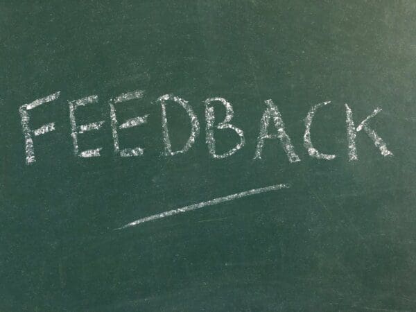 Feedback Feedback written in white chalk isolated on a green chalkboard