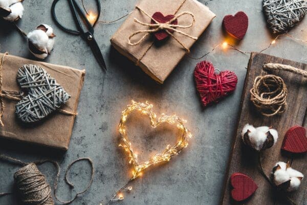 Valentine's gift Wrapped gift with heart on surrounded by other heart