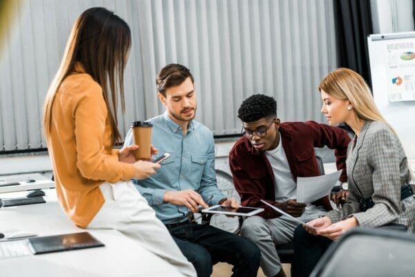 Young businesspeople discussing new business changes