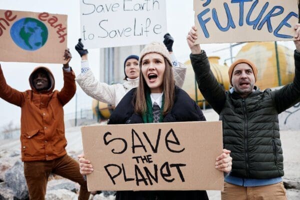 Environmental prospect Young people with environmental protest signs