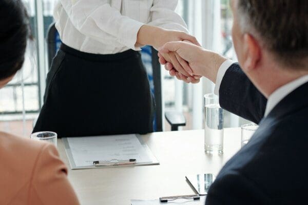 Applicant shaking hands of HR manager