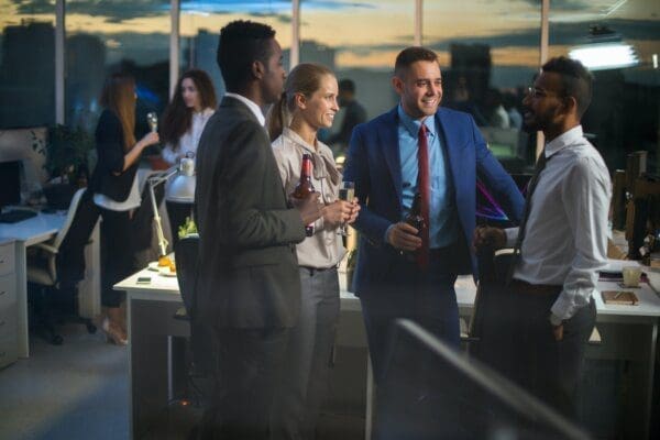 Group of business people having an office party at work