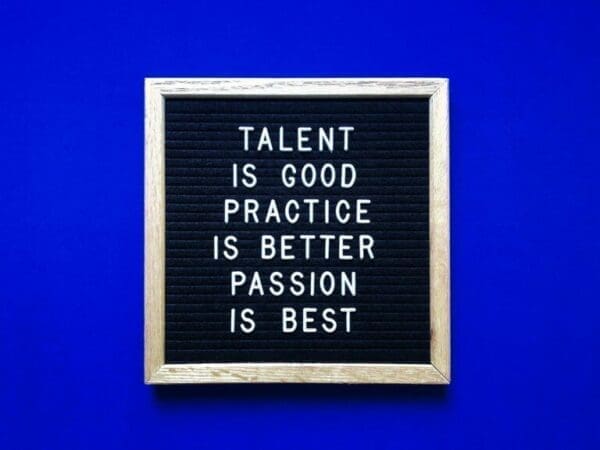 Passion quote Passion quote written on felt board against blue background