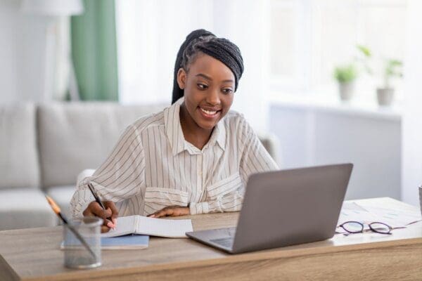Online training Young black lady having online training from home