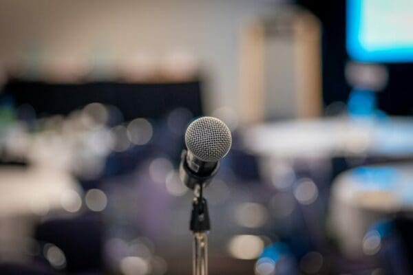Public speaking Close-up of a mike with a blurred background