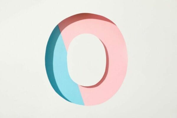 Pink and blue letter O on white background