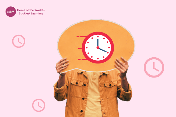 Man holding up a sign with a red clock icon