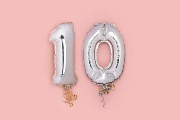 Silver Number ten Balloons on pink background