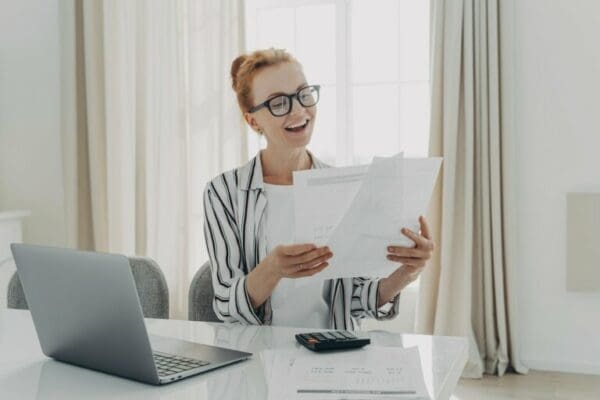 smiling female manager during a report writing training