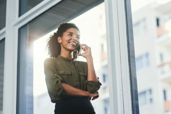 Businesswoman speaing with prospect on the phone