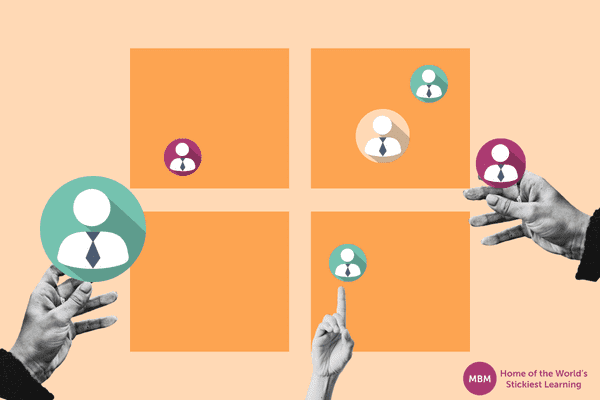 Hands placing stakeholder icons on a Power Interest Matrix