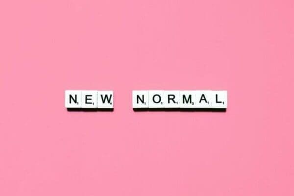 NEW NORMAL on pink background