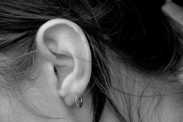 ear with earring Greyscale closeup of an ear with earring